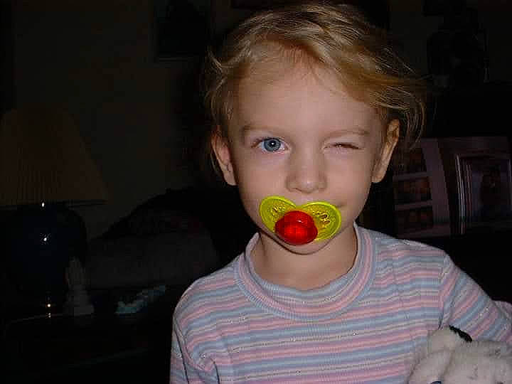 Abbigail is registered to the contest to win money with this photo: baby_toys, cheek, child, ear, eating, eyelash, fun, happy, lamp, lip, mouth, nose, person, play, t_shirt, toddler