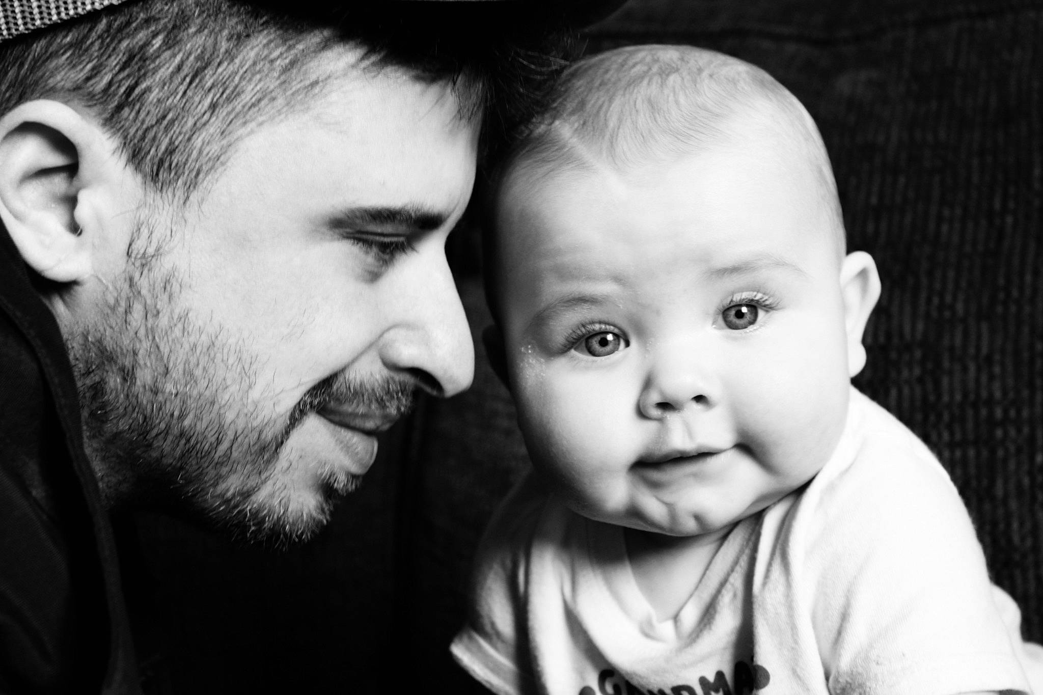 Cashton is registered to the contest to win money with this photo: baby, beard, black, black_and_white, cheek, chin, ear, eyebrow, flash_photography, gesture, hairstyle, happy, iris, mouth, nose, person, photograph, skin, smile, style