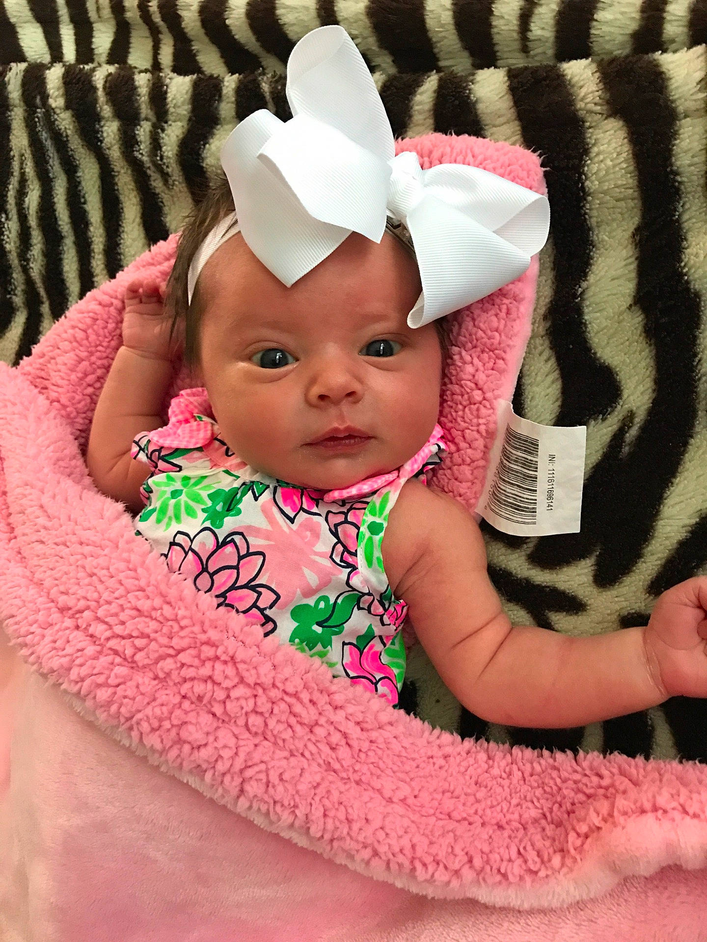 Cambree is registered to the contest to win money with this photo: baby_products, child, ear, fun, girl, hair_accessory, headgear, headwear, infant, person, pink, product, skin, smile, textile, toddler