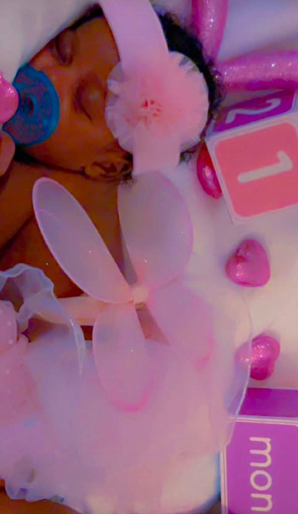 Kayoir is registered to the contest to win money with this photo: baby, blocks, butterfly_wings, child, closeup, cute, decorations, face, headband, hearts, infant, nursery, pacifier, peaceful, pink, portrait, rest, sleeping, soft_toys, toddler