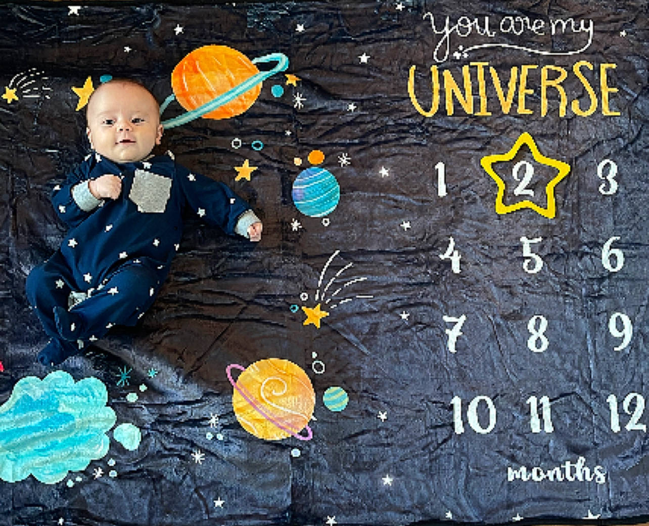 Cody is registered to the contest to win money with this photo: art, asphalt, blackboard, chalk, circle, drawing, event, font, graphic_design, graphics, happy, illustration, organism, paint, painting, pattern, person, space, toddler, visual_arts