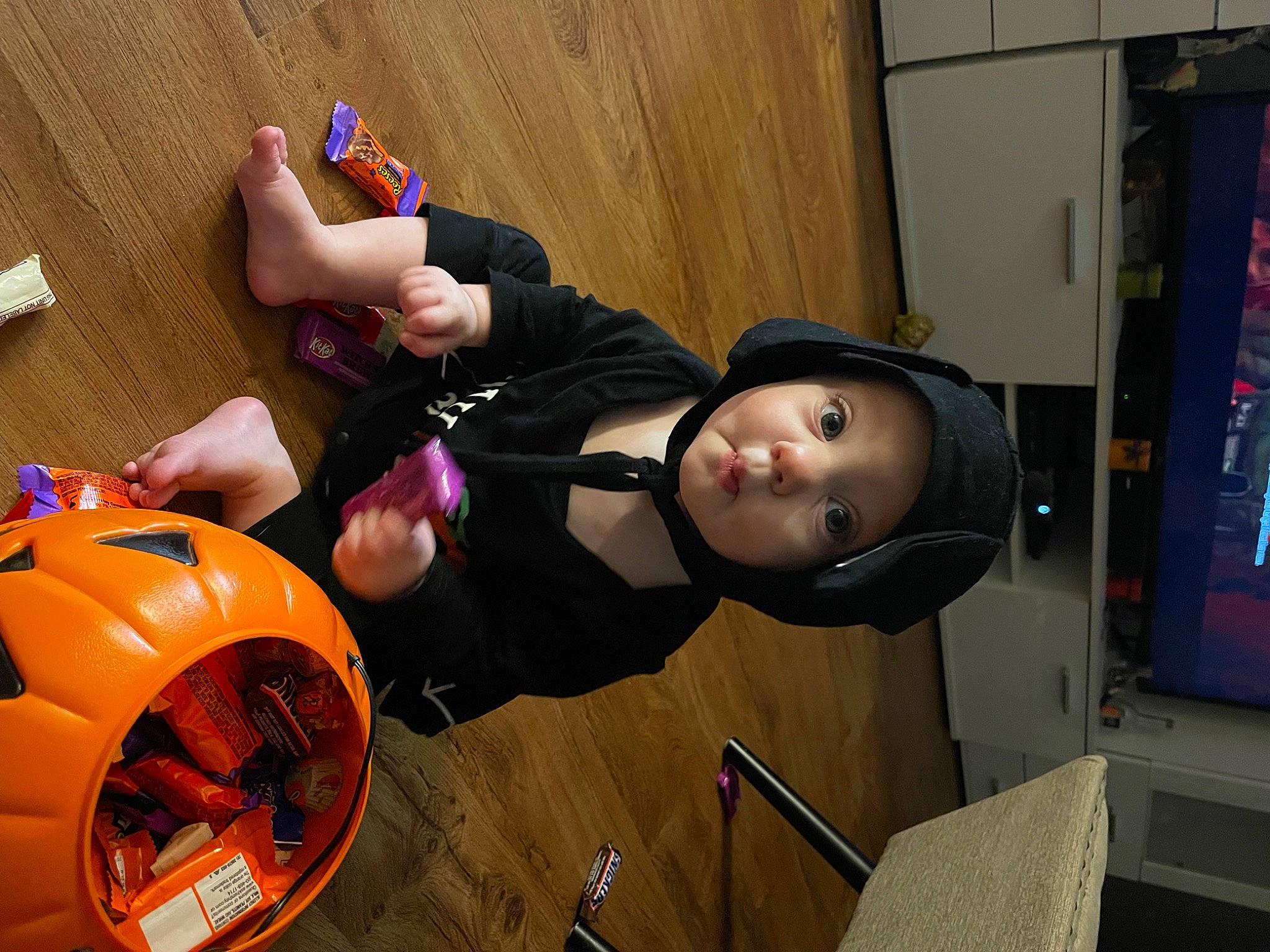 Cali is registered to the contest to win money with this photo: animation, audio_equipment, auto_part, automotive_design, automotive_tire, automotive_wheel_system, child, computer_monitor, costume, flooring, fun, hat, headwear, helmet, machine, person, personal_protective_equipment, rim, room, tire