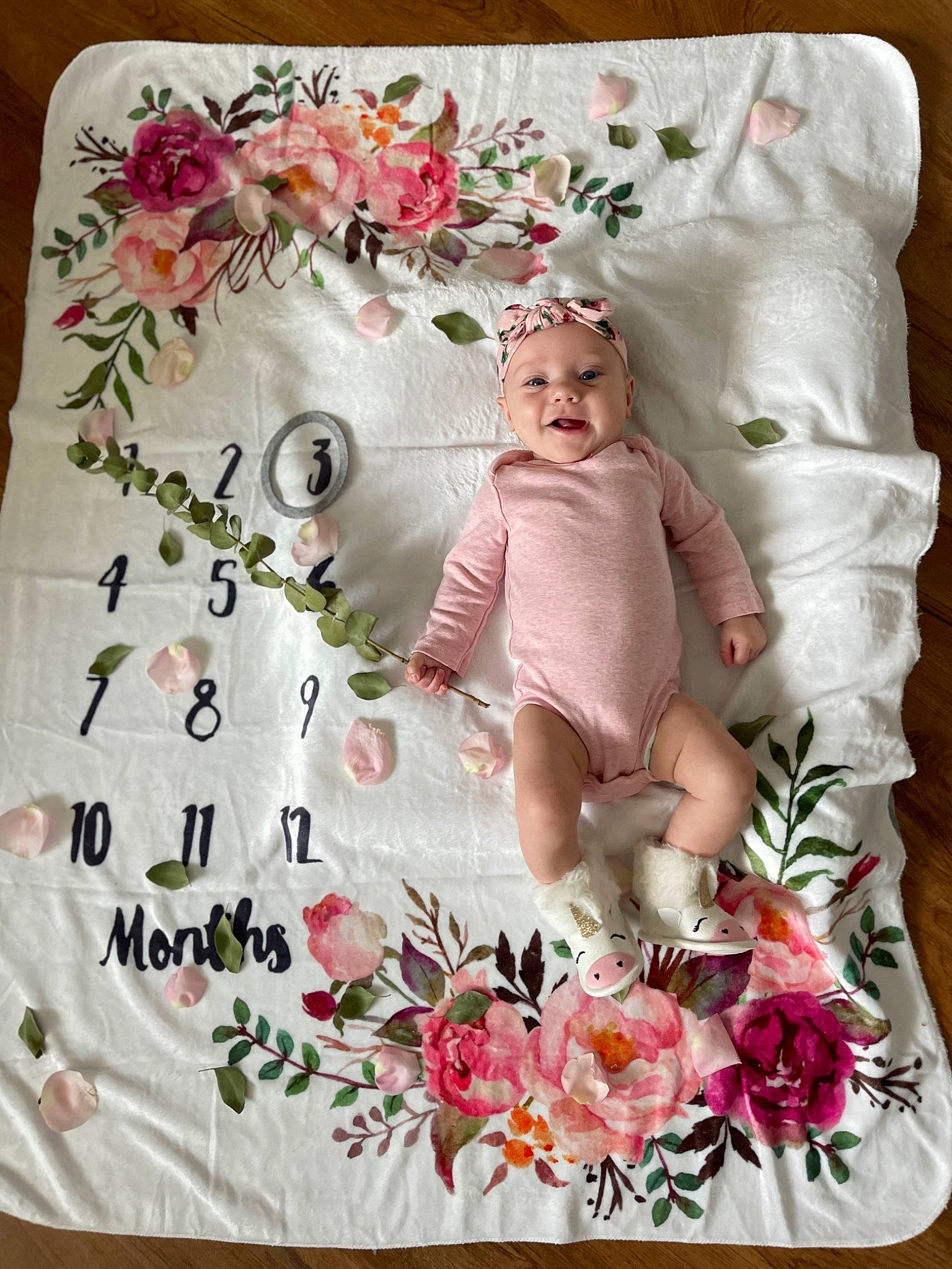 Cali is registered to the contest to win money with this photo: art, baby_toddler_clothing, craft, creative_arts, floral_design, flower, font, headwear, linens, needlework, paper, pattern, peach, pedicel, person, petal, pink, rectangle, rose, sleeve