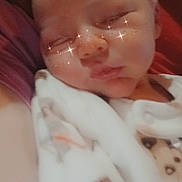 Levi is registered to the contest to win money with this photo: baby, sleeping, blanket, face, freckles, sparkle_filter, child, cozy, soft, rest, cute, infant, peaceful, comfort, portrait, closeup, skin, head, eyes_closed, young