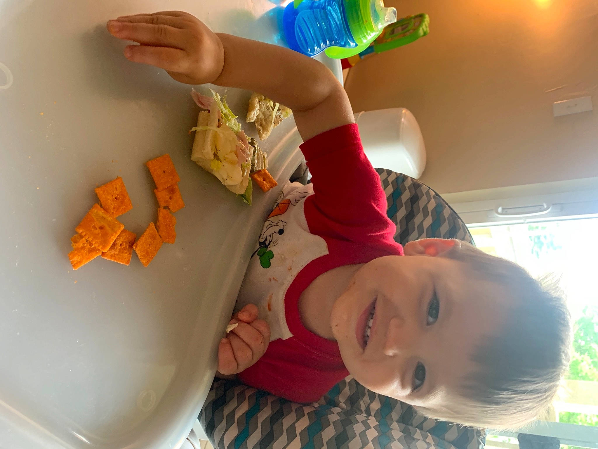 Brenden joined the competition — help win amazing prizes! baby, chair, child, event, finger, fun, gesture, green, happy, hat, joy, leisure, party_supply, person, plant, plastic_bottle, play, room, smile, t_shirt