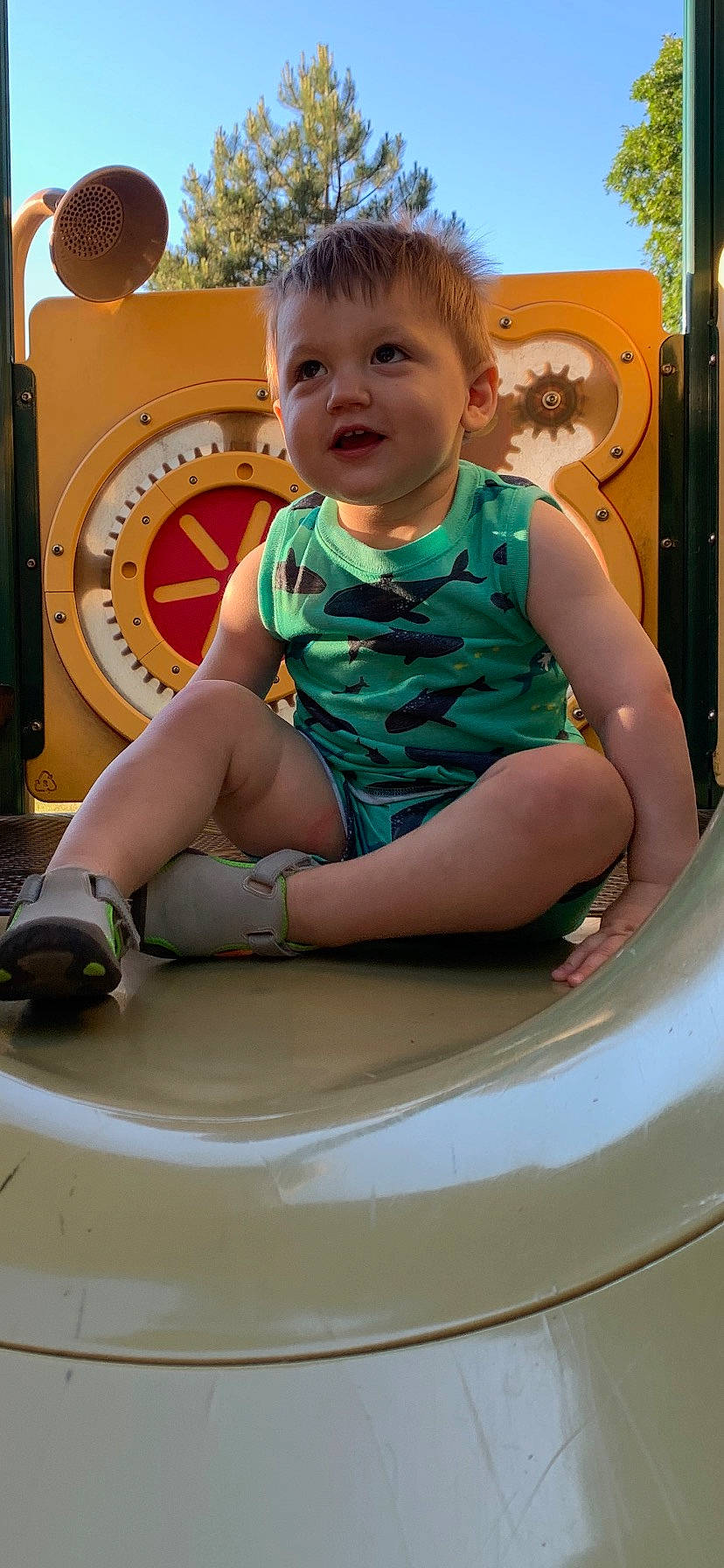 Brenden joined the competition — help win amazing prizes! auto_part, automotive_tire, automotive_wheel_system, baby, baby_toddler_clothing, child, eye, face, fun, hairstyle, happy, human_body, leisure, person, playground, recreation, sitting, smile, standing, tire
