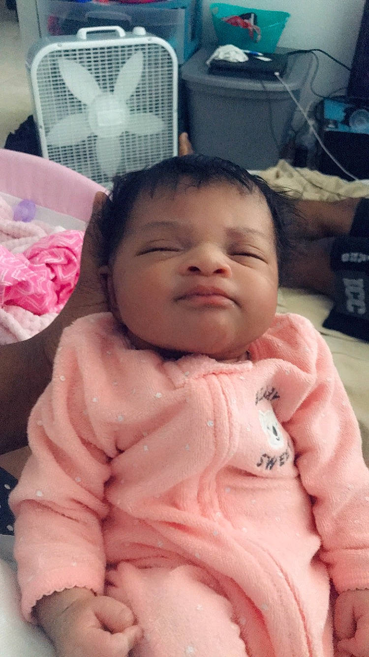 Kamilla is registered to the contest to win money with this photo: baby, cheek, child, eye, face, facial_expression, forehead, head, lip, mouth, nose, person, pink, skin, smile, toddler