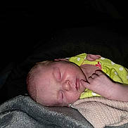 Grace joined the competition — help win amazing prizes! newborn, baby, sleeping, blanket, infant, face, hand, cozy, soft_lighting, polka_dot, green_clothing, nap, peaceful, portrait, cute, child, indoors, skin, resting, toddler