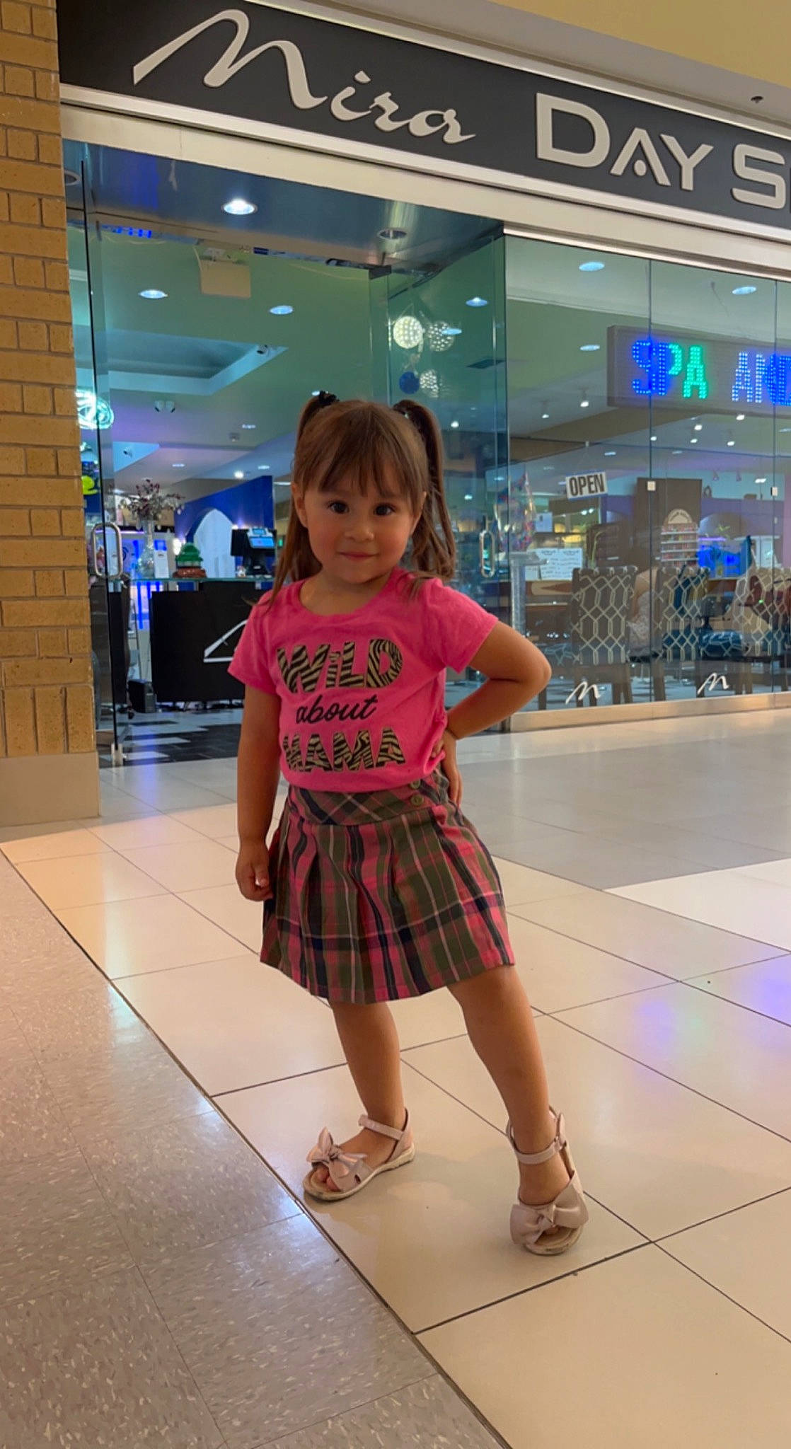 Dulce Cruz is registered to the contest to win money with this photo: beauty, child, dress, event, fashion, fashion_design, floor, flooring, fun, human_leg, joint, leisure, one_piece_garment, person, retail, shopping, skin, standing, thigh, toddler