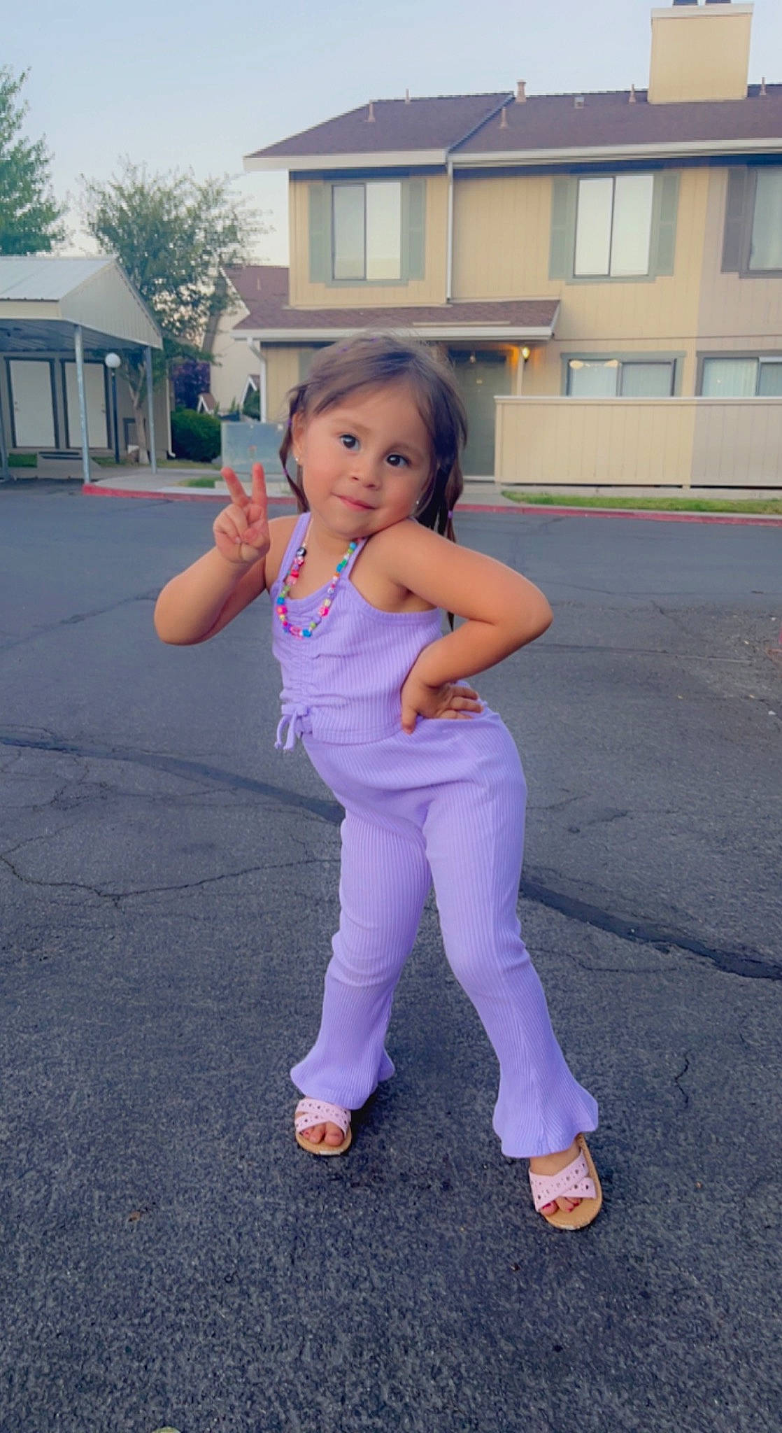 Dulce Cruz is registered to the contest to win money with this photo: arm, barefoot, electric_blue, foot, footwear, gesture, happy, human_body, human_leg, leg, leisure, person, pink, plant, purple, recreation, thigh, thumb, toddler, waist