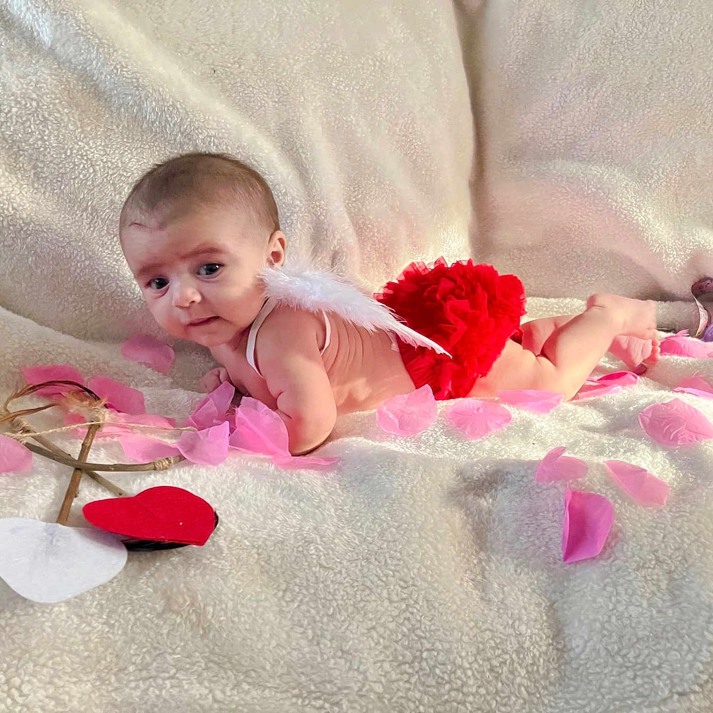 Ophelia joined the competition — help win amazing prizes! baby, bed, bedroom, blanket, crawling, face, flower, furniture, head, indoors, newborn, person, petal, photography, plant, portrait, quilt, room, rose, symbol