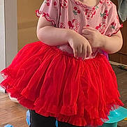 Olivia joined the competition — help win amazing prizes! child, toddler, girl, red_tutu, headband, bow, smiling, happy, pink_shirt, black_boots, indoor, wooden_floor, portrait, cute, pose, playful, toy_in_background, short_hair, big_eyes, casual_clothing