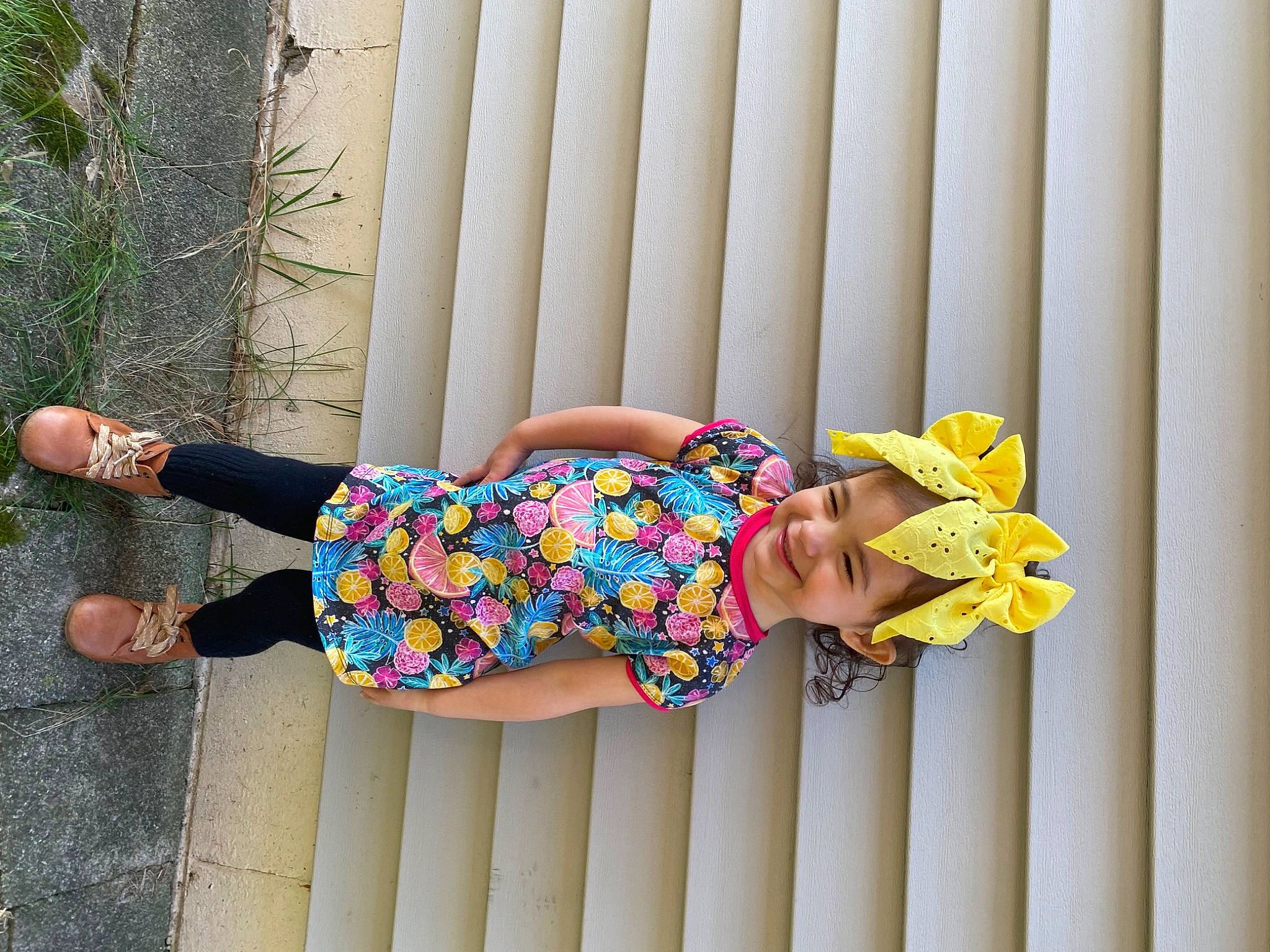 Emily joined the competition — help win amazing prizes! baby_toddler_clothing, child, foot, happy, headwear, human_leg, joy, knee, leisure, magenta, pattern, person, pink, sandal, sitting, sleeve, sunglasses, thigh, toy, waist