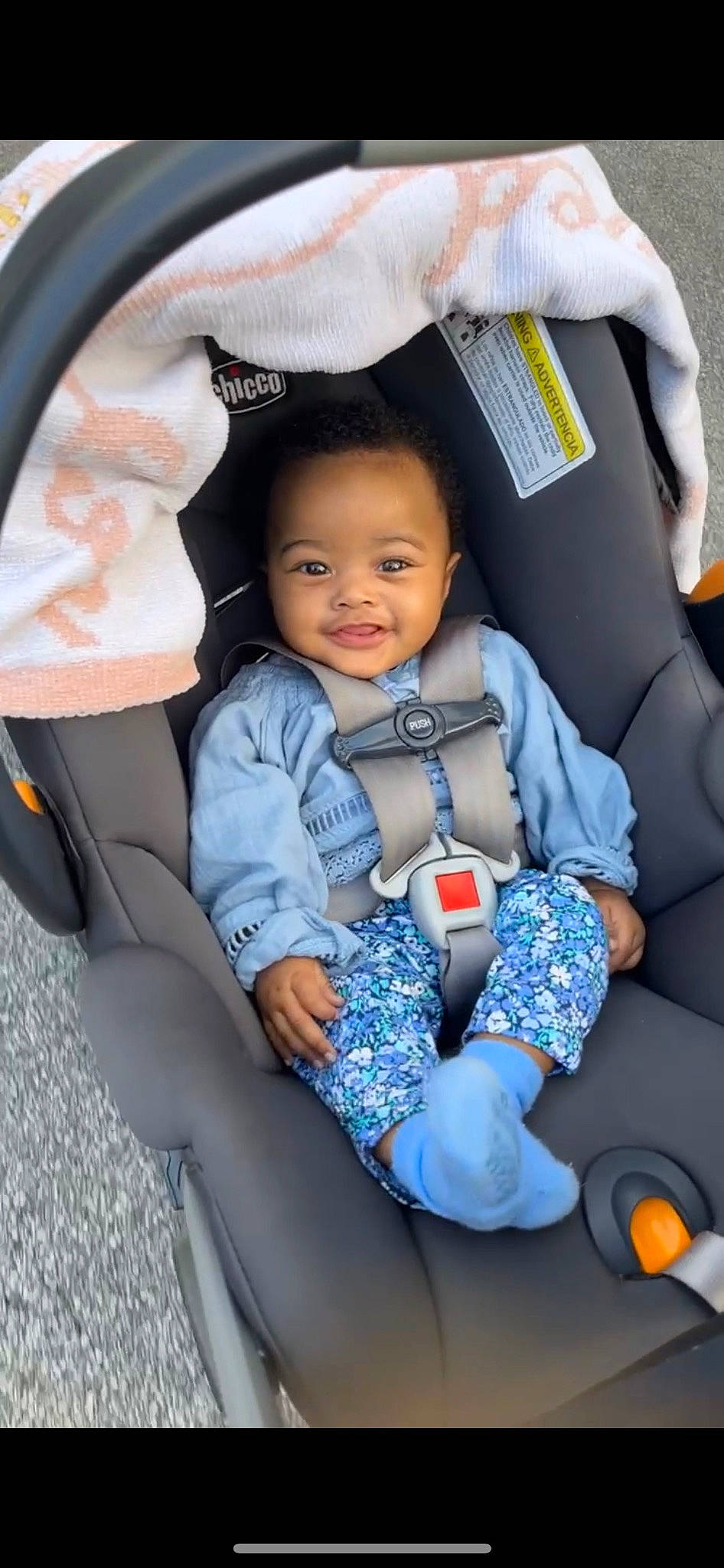 Brooklyn is registered to the contest to win money with this photo: auto_part, baby, baby_carriage, baby_in_car_seat, baby_products, baby_toddler_clothing, car_seat, child, comfort, electric_blue, finger, head, head_restraint, joy, leisure, person, product, sitting, sleeve, smile