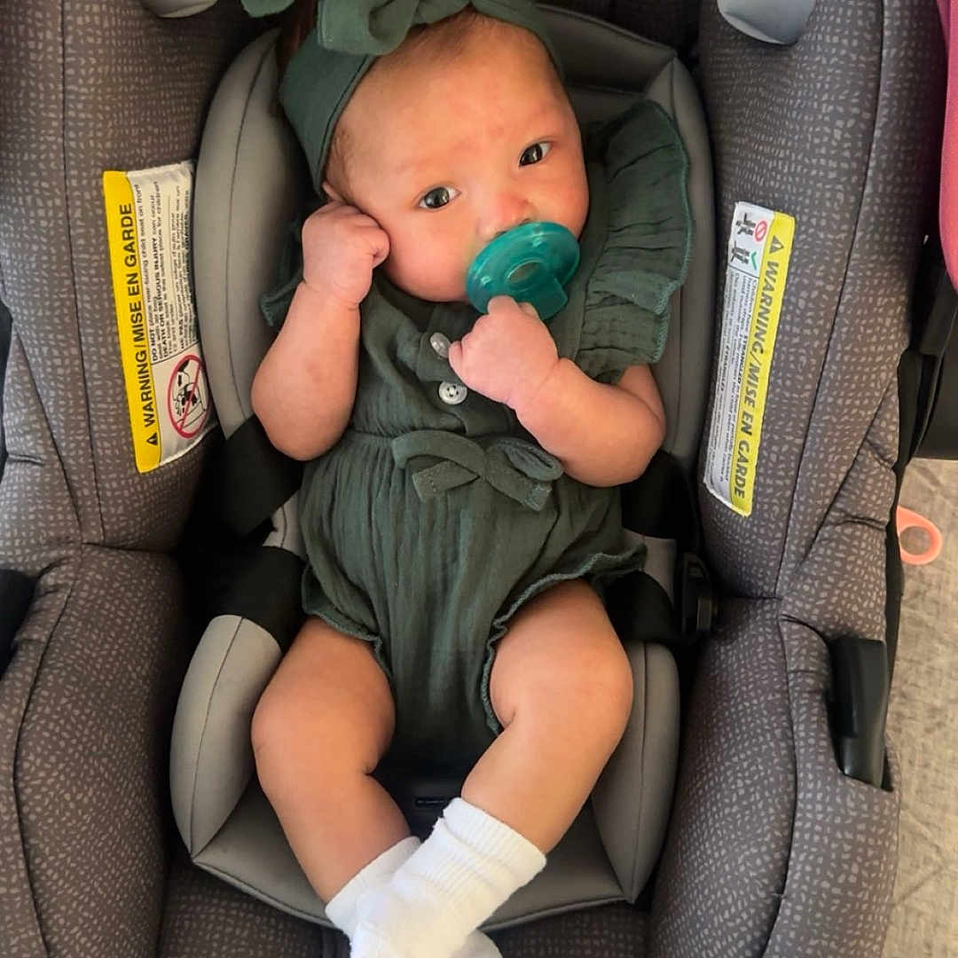 Kyloni is registered to the contest to win money with this photo: baby, car, clothing, cream, cushion, dessert, face, footwear, glove, hat, head, homedecor, hosiery, person, photography, portrait, shoe, sock, transportation, vehicle