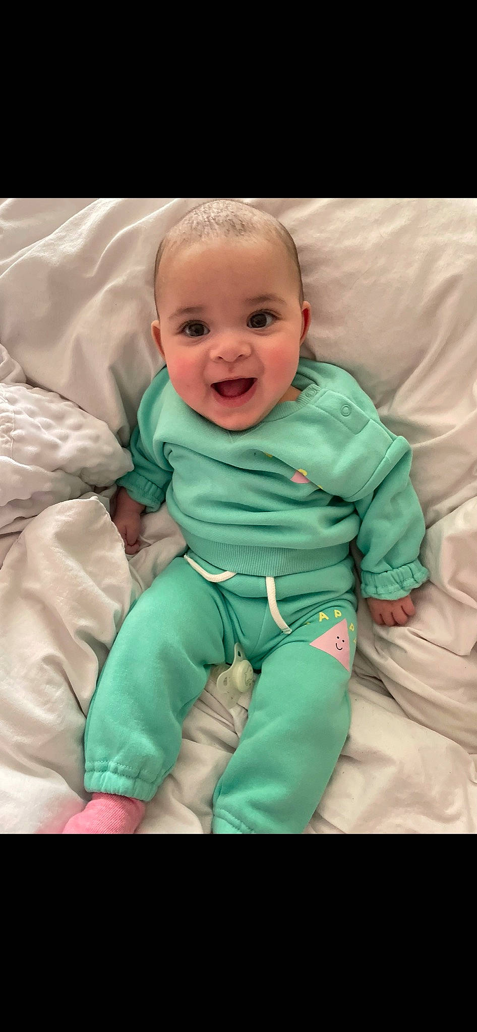 Bonnie joined the competition — help win amazing prizes! baby, baby_products, baby_toddler_clothing, cheek, child, comfort, event, face, fun, gesture, happy, linens, person, product, sitting, skin, sleeve, smile, textile, thumb