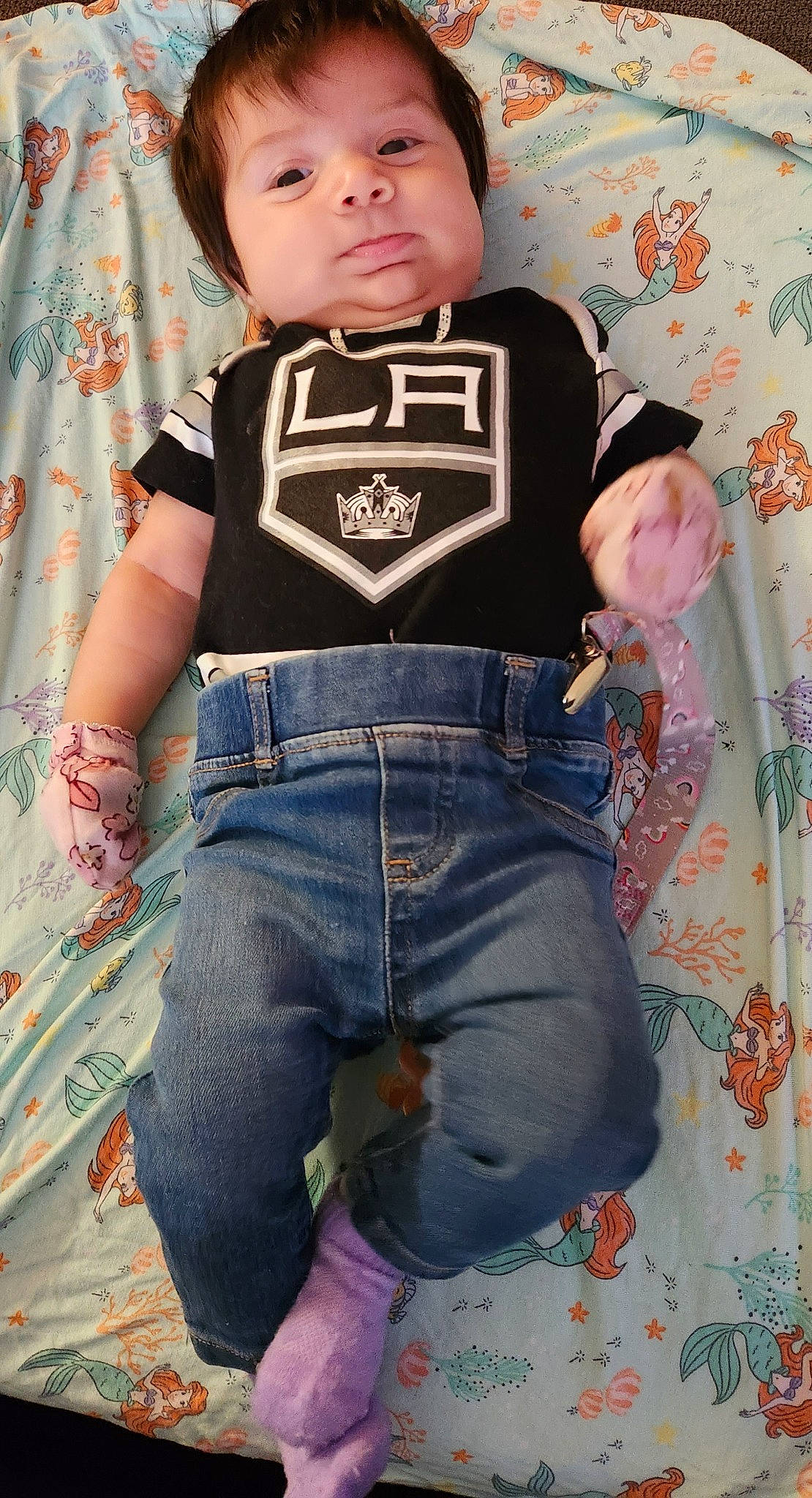 Ariel is registered to the contest to win money with this photo: arm, baby, baby_toddler_clothing, child, cool, denim, electric_blue, eye, fashion_design, pattern, person, pink, plaid, pocket, skin, sleeve, standing, t_shirt, thigh, toddler