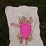 baby, infant, sleeping, pink_outfit, headband, blanket, grass, outdoor, nature, child, peaceful, cute, resting, one_person, skin, barefoot, summer, relaxing, portrait, soft