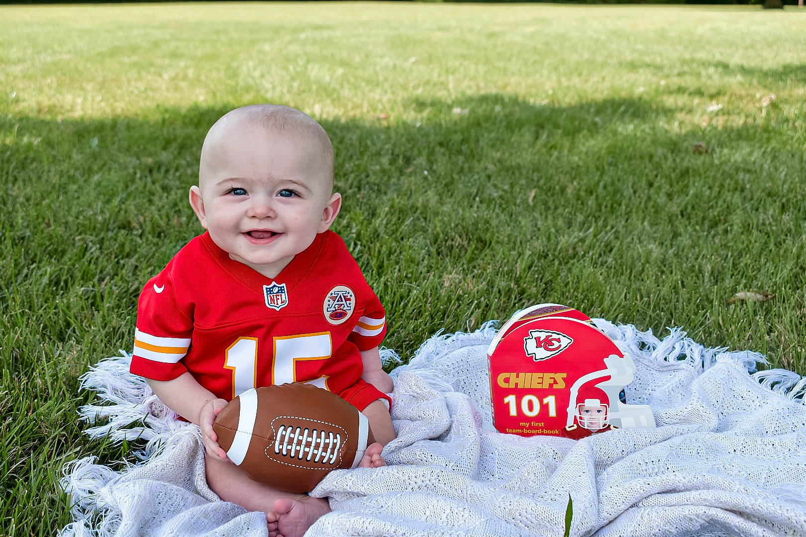 Freddy joined the competition — help win amazing prizes! baby, baby_toddler_clothing, ball, carmine, child, flooring, football, fun, grass, happy, joy, lawn, people_in_nature, person, player, playing_sports, recreation, smile, soccer_ball, sports_equipment