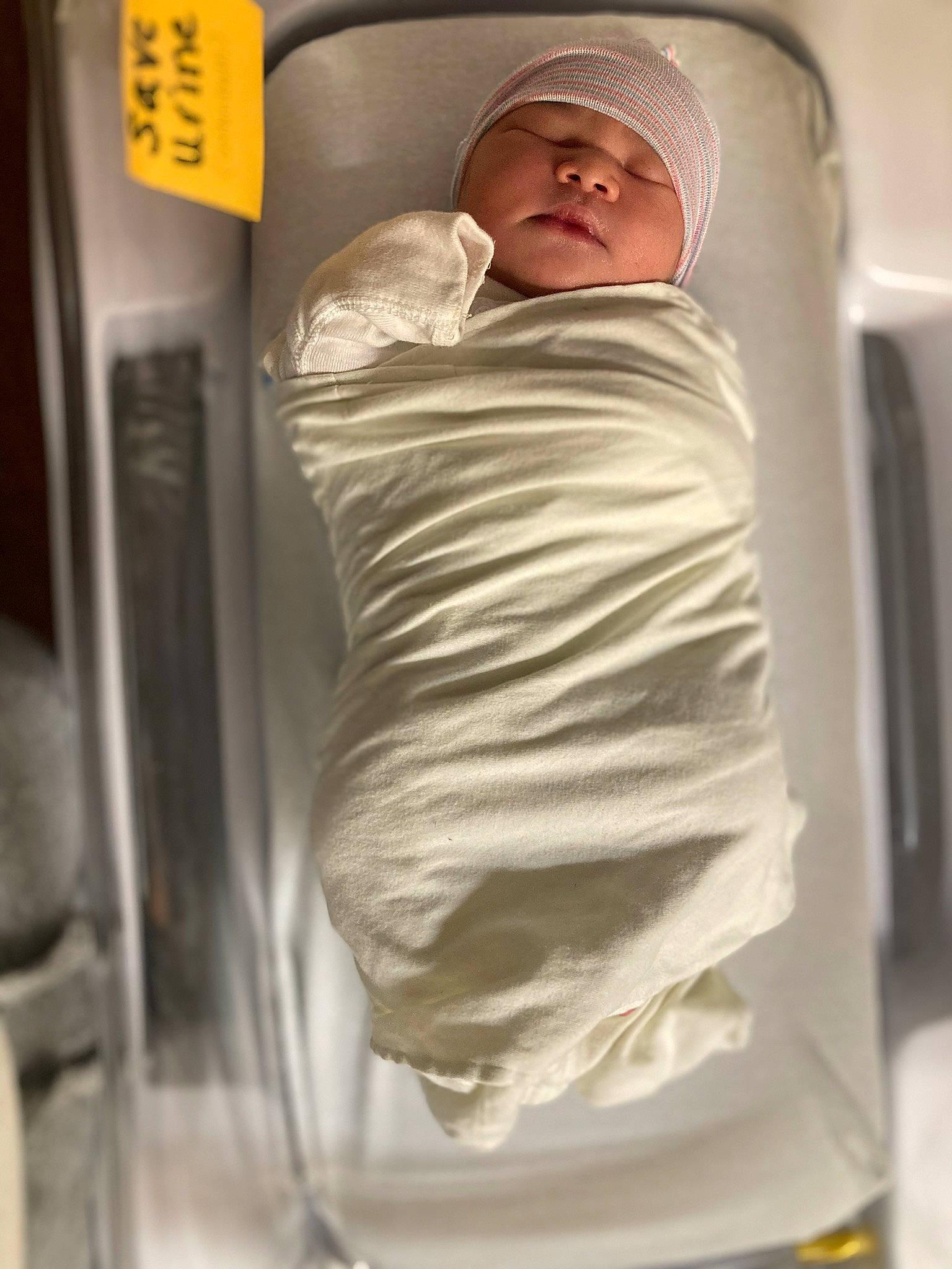 Jaylani joined the competition — help win amazing prizes! baby, baby_sleeping, comfort, headwear, linens, nap, person, plastic, sleep, transparency, transparent_material