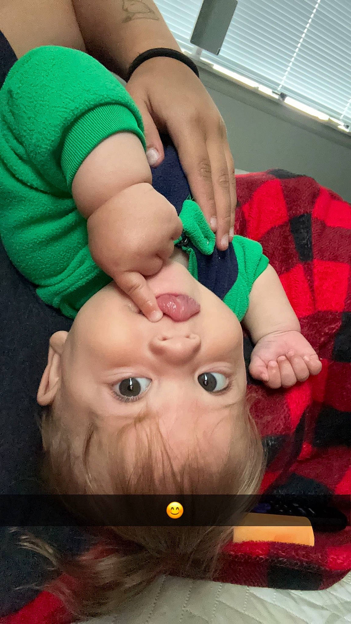 Shane is registered to the contest to win money with this photo: baby, cheek, chest, event, eye, flesh, fun, gesture, grass, green, happy, holiday, leisure, mouth, nail, person, red, room, thumb, toddler