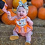 autumn, baby, bow, celebration, child, cute, festive, footwear, halloween, hand, happy, hay, headband, orange, outdoor, person, pumpkin, seasonal, sitting, smiling