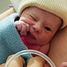 baby, blanket, care, cozy, cute, hand, hat, holding, hospital, infant, love, medical, newborn, person, portrait, skin, small, tenderness, tube, winking
