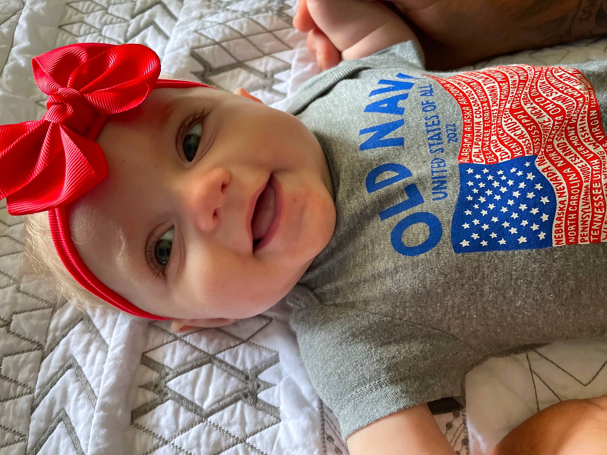 Karley joined the competition — help win amazing prizes! baby_toddler_clothing, chin, cool, elbow, eye, face, happy, hat, head, headgear, headwear, lip, mouth, nose, organ, person, skin, sleeve, smile, textile
