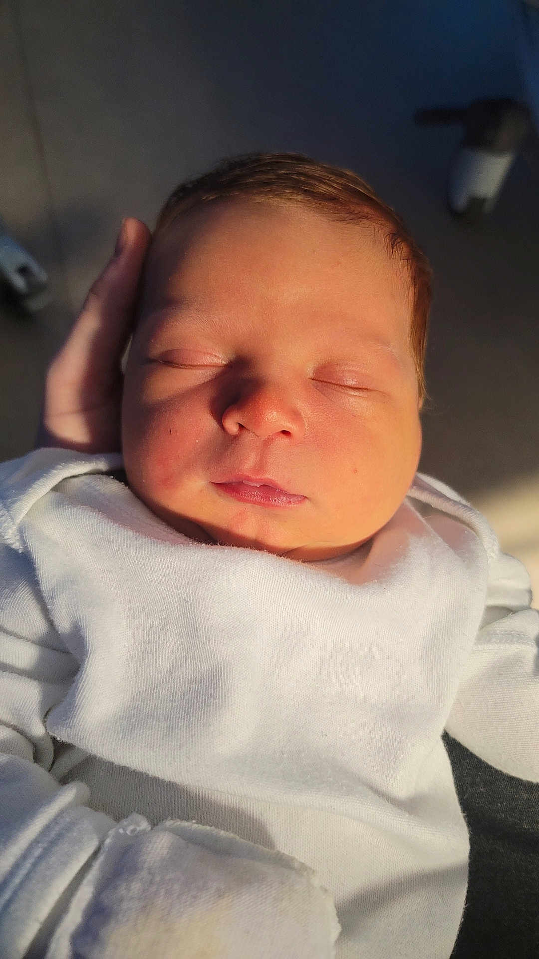 Rhydian-Cole joined the competition — help win amazing prizes! baby, newborn, sleeping, infant, white_clothing, hand, peaceful, closeup, soft_light, face, skin, portrait, child, cute, rest, warm_light, human, indoors, person, calm