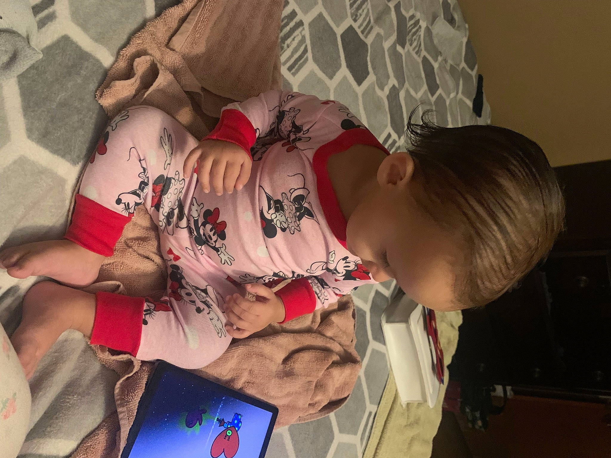 Isabella is registered to the contest to win money with this photo: baby, carmine, chest, child, communication_device, elbow, finger, flesh, fun, human_leg, mobile_phone, mouth, nail, pattern, person, tattoo, thigh, toddler, trunk, visual_arts