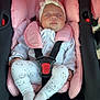 Maëlie a rejoint le concours — aidez-le/la à gagner de superbes lots ! baby, sleeping, car_seat, pink, headband, white_clothing, socks, straps, infant, child, cushion, seat, safety, adorable, peaceful, indoor, transport, cute, resting, person