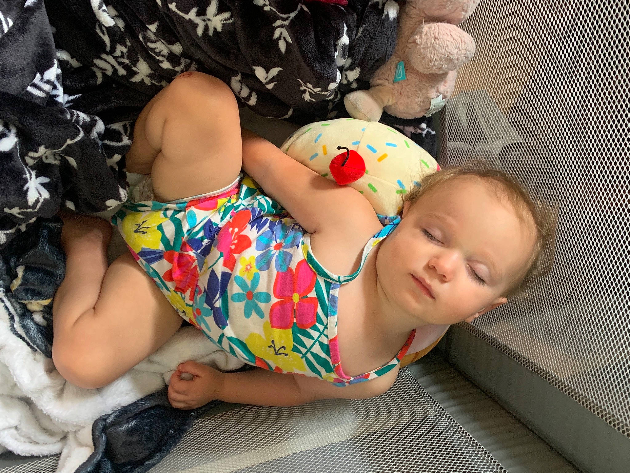 Adley is registered to the contest to win money with this photo: abdomen, baby, baby_products, baby_toddler_clothing, child, comfort, foot, fun, grass, head, human_leg, joint, lap, leg, leisure, pattern, person, sitting, thigh, toddler