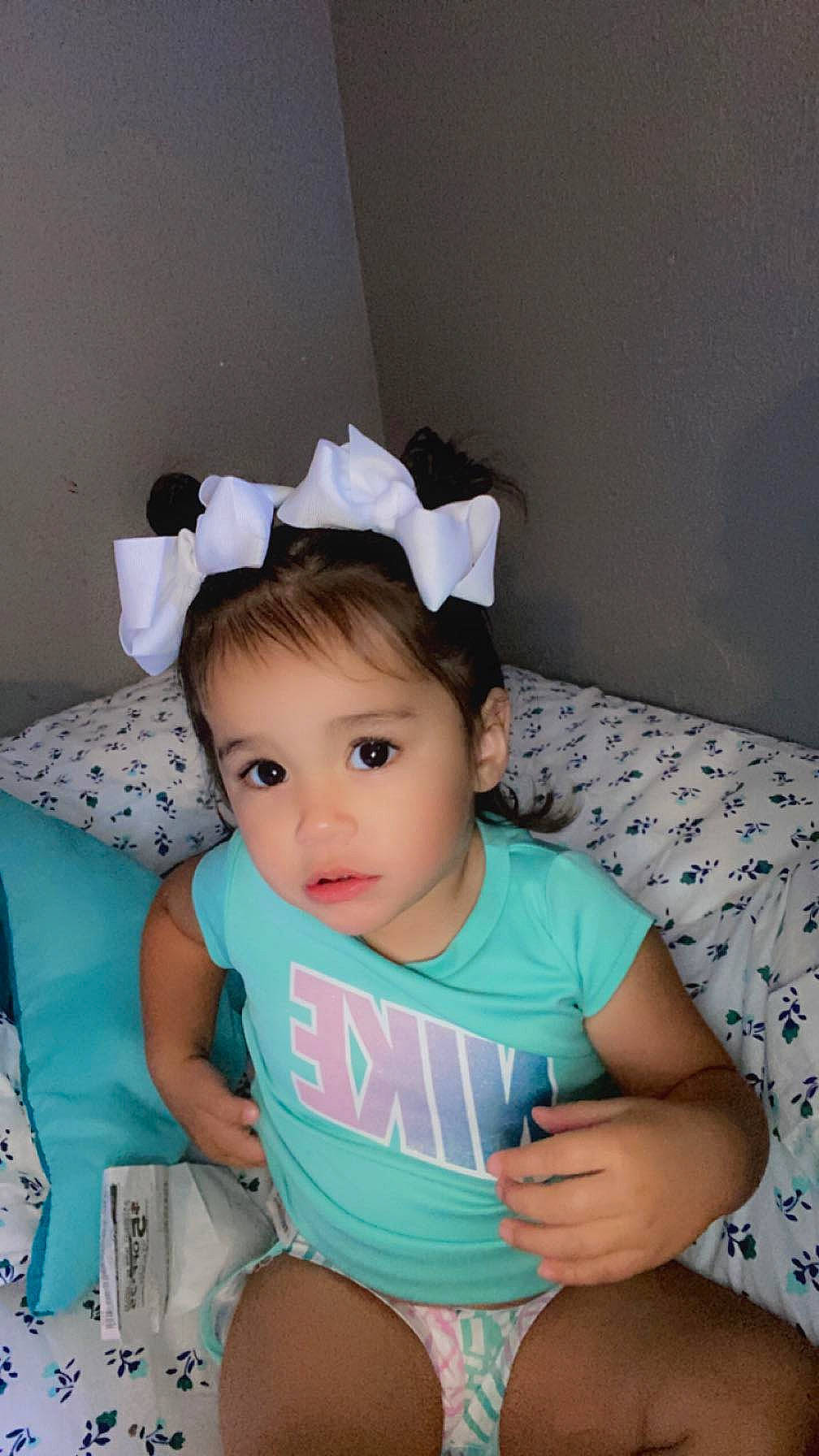 Sofia joined the competition — help win amazing prizes! baby, baby_products, baby_toddler_clothing, cap, cheek, child, comfort, cool, costume_hat, eye, happy, headband, human_leg, neck, person, sitting, skin, sleeve, textile, thigh