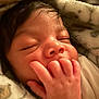 Adaijah is registered to the contest to win money with this photo: baby, newborn, sleeping, hand, fingers, blanket, face, infant, closeup, soft, cute, skin, peaceful, indoors, portrait, child, resting, warm, cozy, love