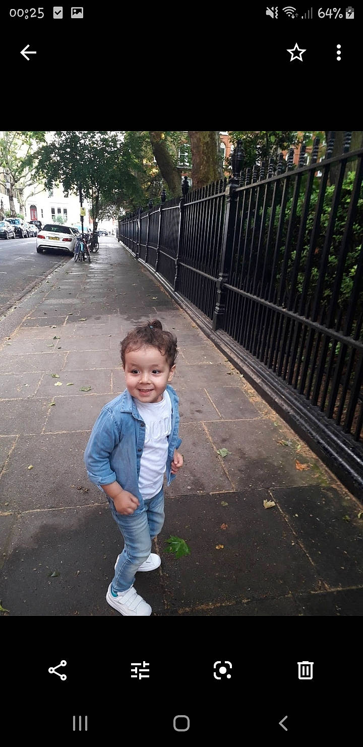 Yunes is registered to the contest to win money with this photo: asphalt, child, joy, lane, metal, person, photography, road, shoe, sidewalk, snapshot, standing, toddler, walking