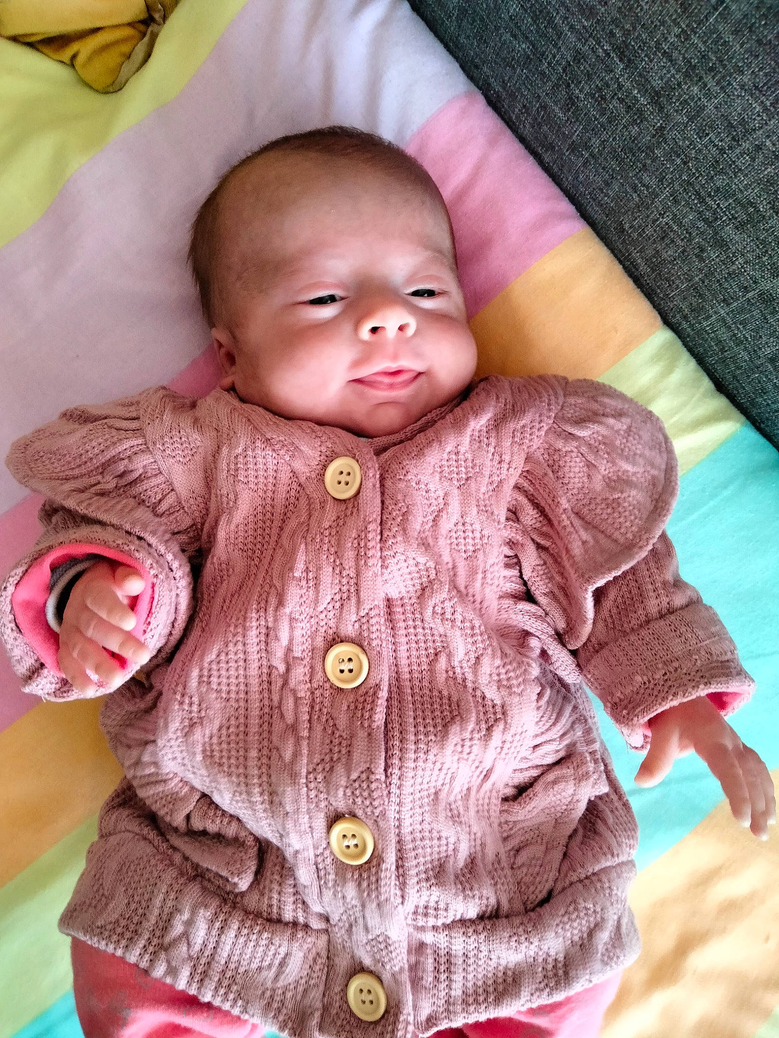 Léane participe au concours pour gagner de l'argent avec cette photo : baby_toddler_clothing, cheek, doll, dress, eye, hair, hand, head, human_body, iris, joint, lip, mouth, neck, nose, outerwear, person, skin, sleeve, textile