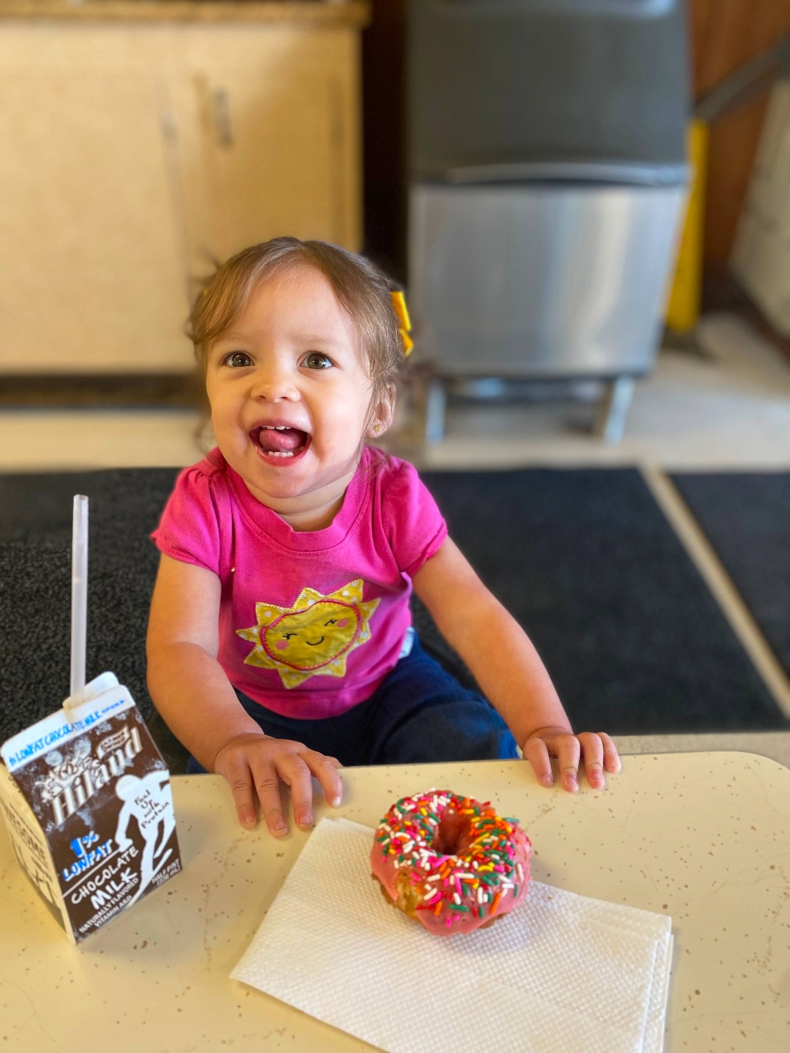 Imani joined the competition — help win amazing prizes! art, chair, child, circle, desk, flooring, fun, happy, indoor_games_and_sports, person, plate, play, recreation, room, smile, sweetness, t_shirt, table, tableware, toddler