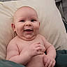 Oakland joined the competition — help win amazing prizes! baby, smiling, diaper, blanket, pillow, bed, wood_paneling, happy, infant, skin, chubby, sitting, indoors, comfortable, cute, child, portrait, relaxed, young, person