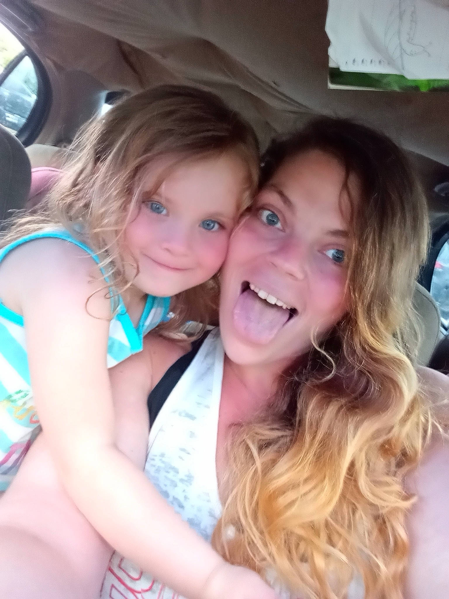 Makayla is registered to the contest to win money with this photo: car, eye, facial_expression, finger, friendship, fun, gesture, happy, human, interaction, iris, joy, leisure, lip, mammal, mouth, person, shoulder, skin, smile