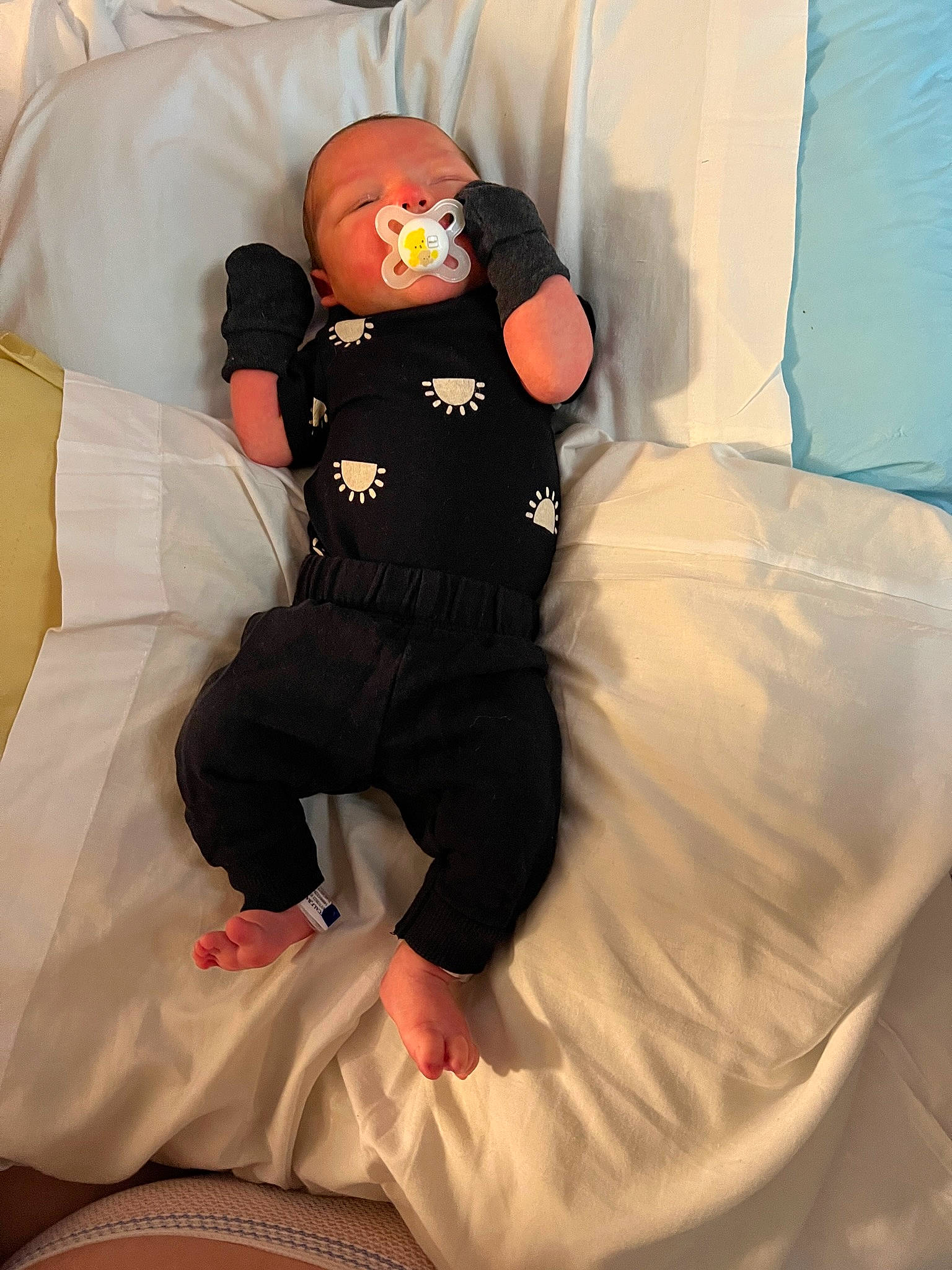 Cruz joined the competition — help win amazing prizes! bed, bedding, bedroom, comfort, fun, hat, human_body, human_leg, inflatable, knee, leg, leisure, linens, person, pillow, shorts, sitting, t_shirt, textile, thigh