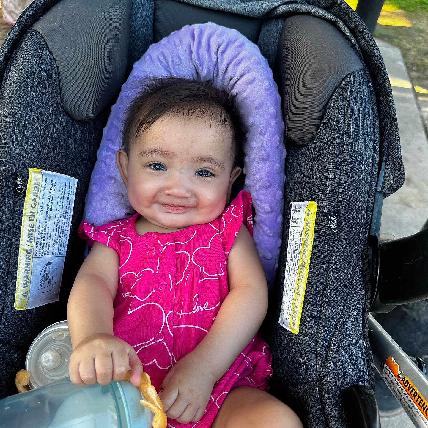 Mia is registered to the contest to win money with this photo: baby, bottle, car, child, clothing, crib, face, female, furniture, girl, hat, head, infantbed, person, photography, portrait, stroller, transportation, vehicle, wristwatch