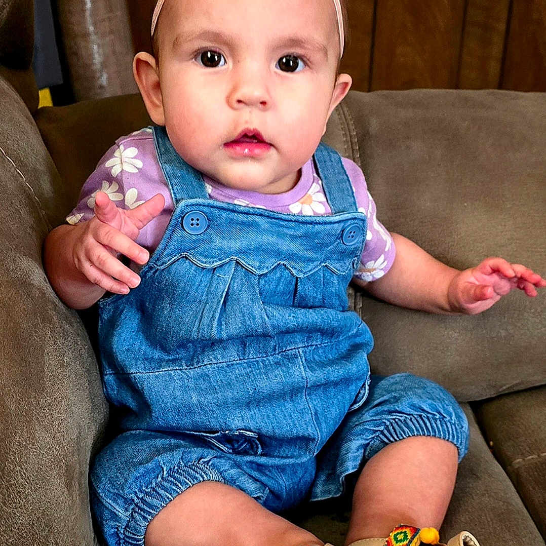 Amor joined the competition — help win amazing prizes! baby, bodypart, chair, clothing, couch, face, finger, footwear, furniture, hand, head, jeans, pants, person, photography, portrait, sandal, shoe, sitting, sneaker