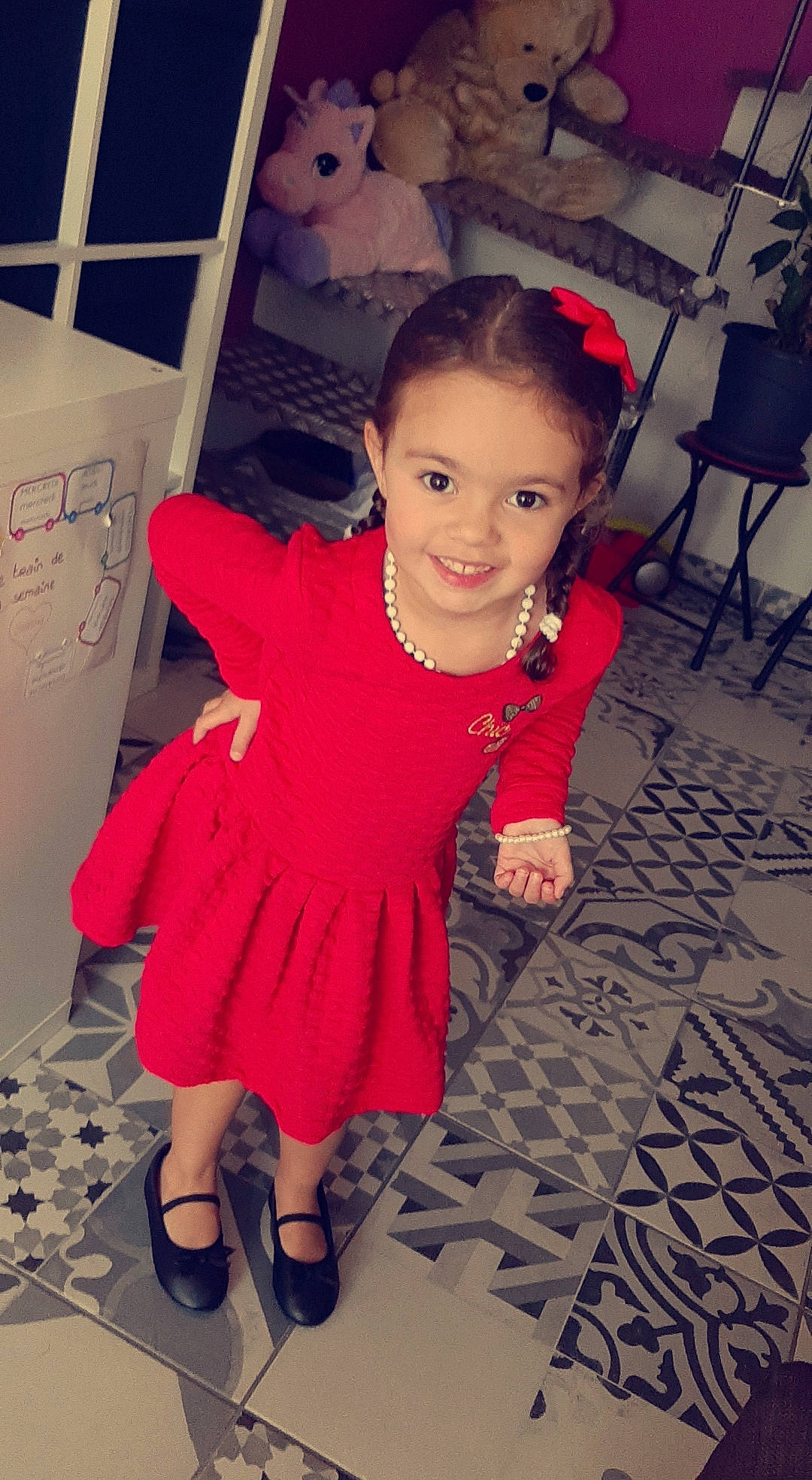 Selena participe au concours pour gagner de l'argent avec cette photo : baby_toddler_clothing, child, day_dress, dress, fashion_design, floor, flooring, formal_wear, fun, happy, joint, joy, leg, magenta, person, pink, sandal, skin, smile, standing