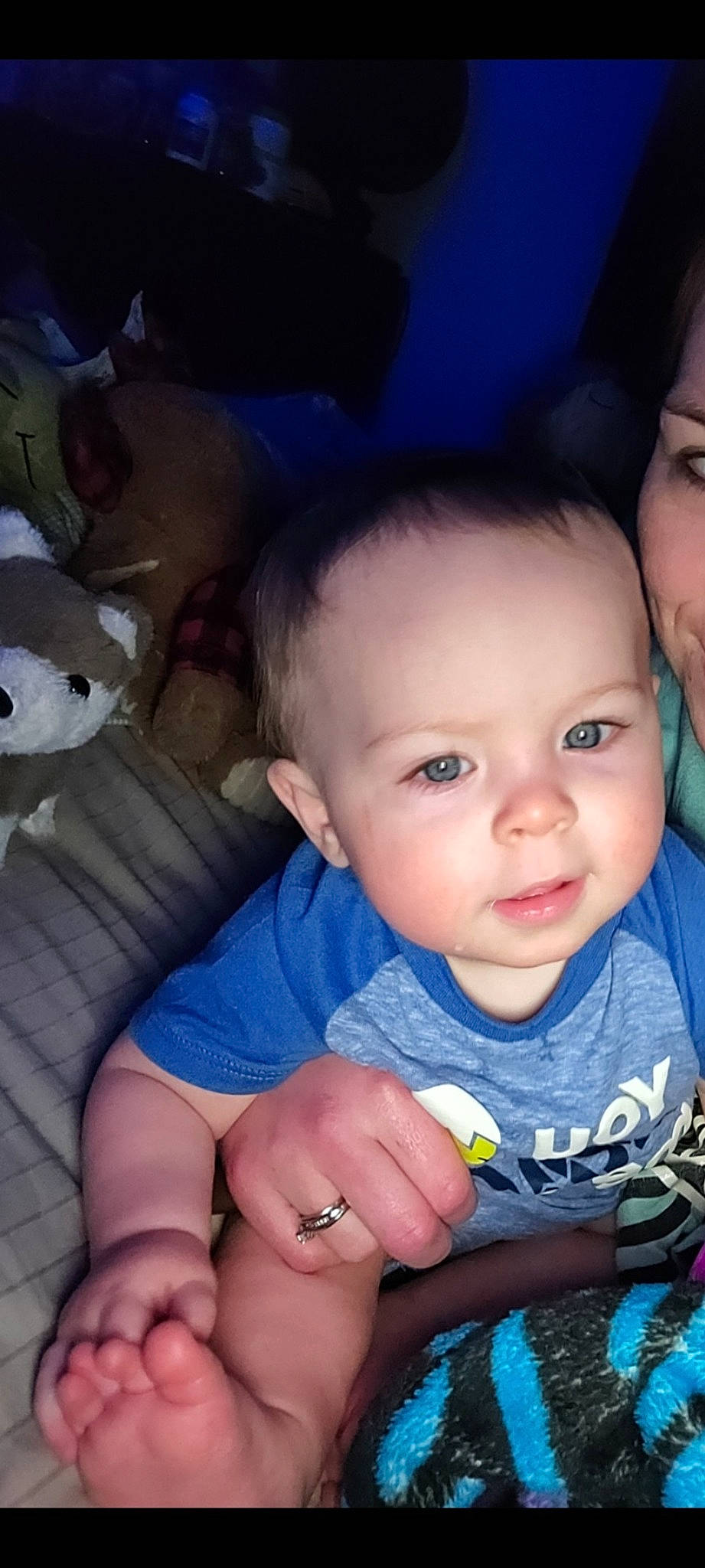 River is registered to the contest to win money with this photo: azure, baby_toddler_clothing, black, blue, cheek, chin, ear, eye, head, iris, lip, mammal, mouth, nose, organ, person, photograph, skin, smile, vertebrate