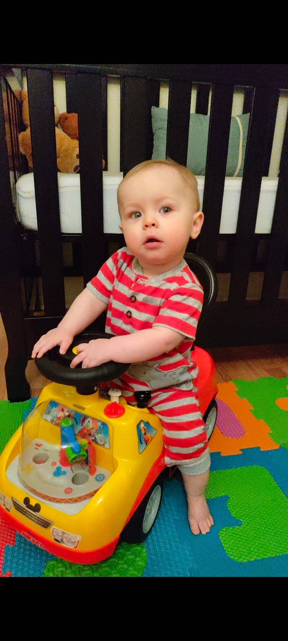 River is registered to the contest to win money with this photo: baby, baby_playing_with_toys, baby_products, baby_toddler_clothing, baby_toys, child, flooring, fun, leisure, pattern, person, plastic, play, riding_toy, room, sharing, sitting, toddler, toy, toy_vehicle
