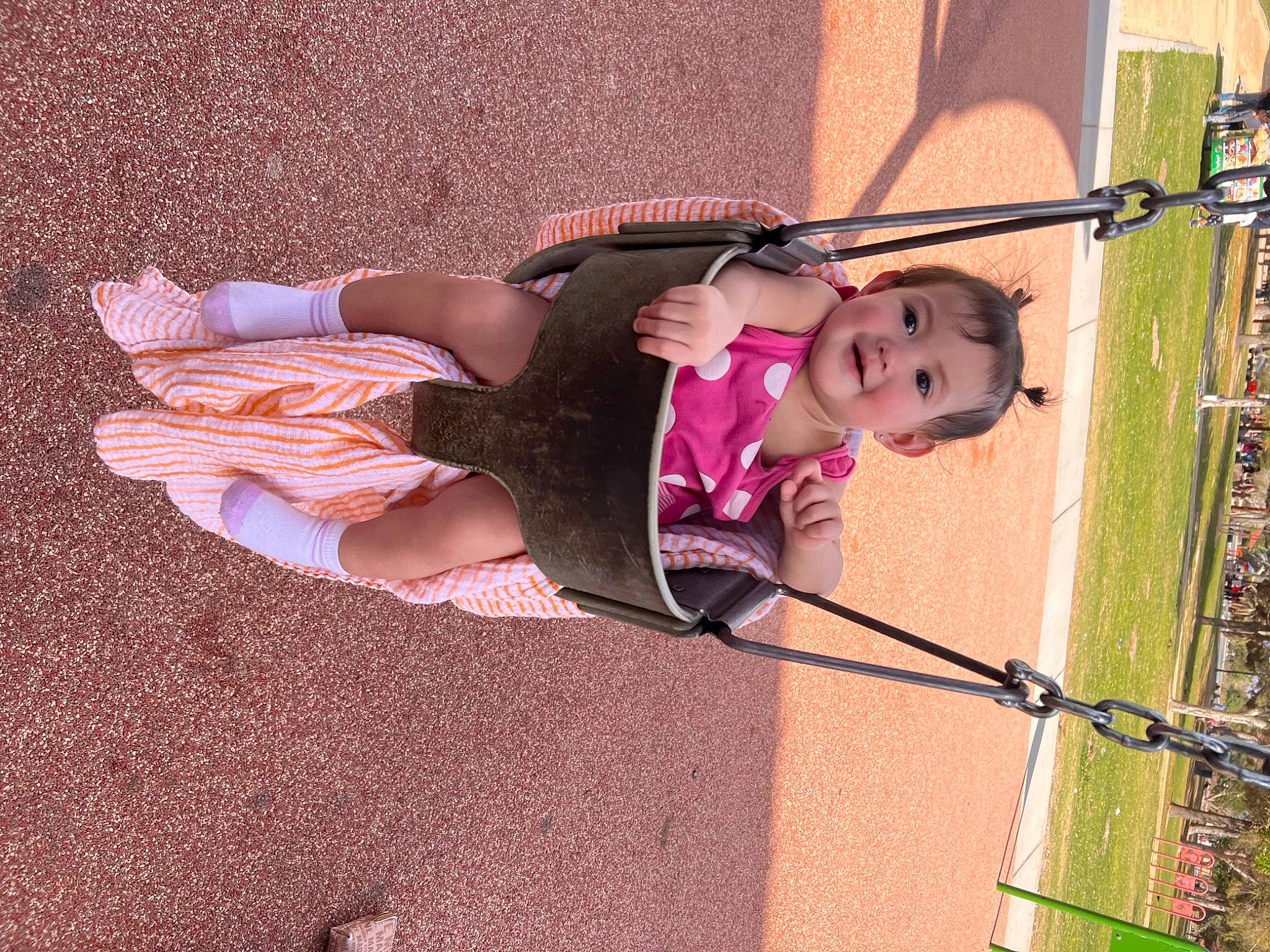 Ariella joined the competition — help win amazing prizes! baby_products, child, city, fun, grass, human_leg, joy, knee, leisure, magenta, outdoor_play_equipment, person, pink, playground, recreation, shadow, smile, thigh, toddler, tree