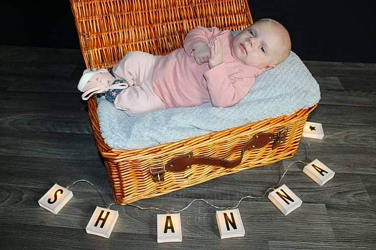 Shanna participe au concours pour gagner de l'argent avec cette photo : baby, baby_products, baby_safety, baby_sleeping, baby_toddler_clothing, basket, child, comfort, flooring, hardwood, home_accessories, infant_bed, linens, mammal, person, rectangle, room, sitting, toddler, wicker