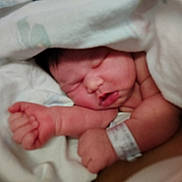 Daysha is registered to the contest to win money with this photo: newborn, baby, sleeping, blanket, hospital, wristband, infant, skin, face, hand, peaceful, cute, rest, soft, closeup, child, wrapped, lying, portrait, newborn_baby