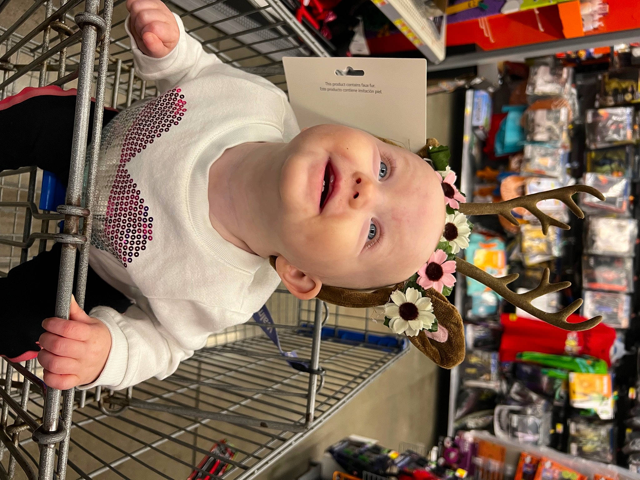 Everett is registered to the contest to win money with this photo: baby, baby_toddler_clothing, child, convenience_store, customer, engineering, fashion_accessory, fun, hat, machine, person, personal_protective_equipment, retail, room, service, shelf, smile, supermarket, toddler, toy