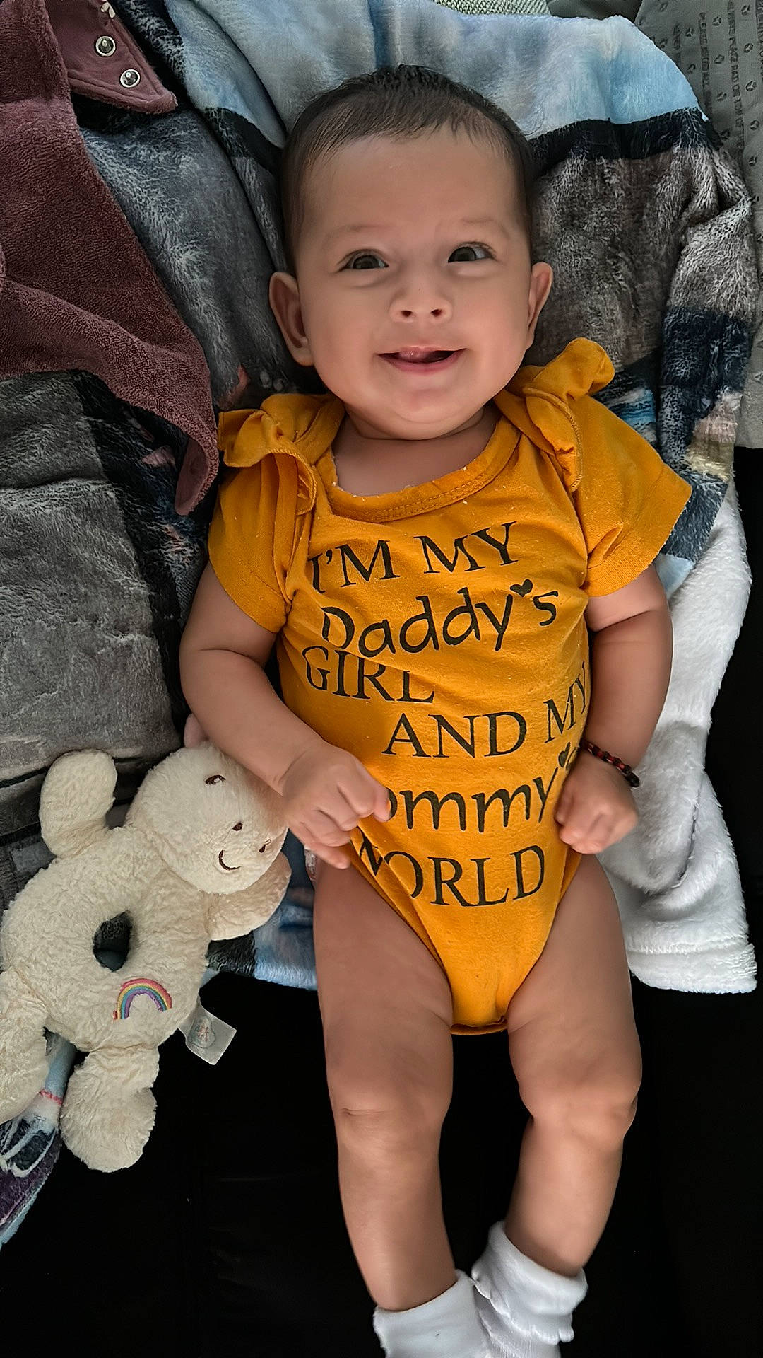 Angeline is registered to the contest to win money with this photo: baby, baby_toddler_clothing, face, finger, hand, happy, human_body, leg, mammal, organ, person, pink, product, skin, sleeve, smile, textile, thigh, thumb, toddler